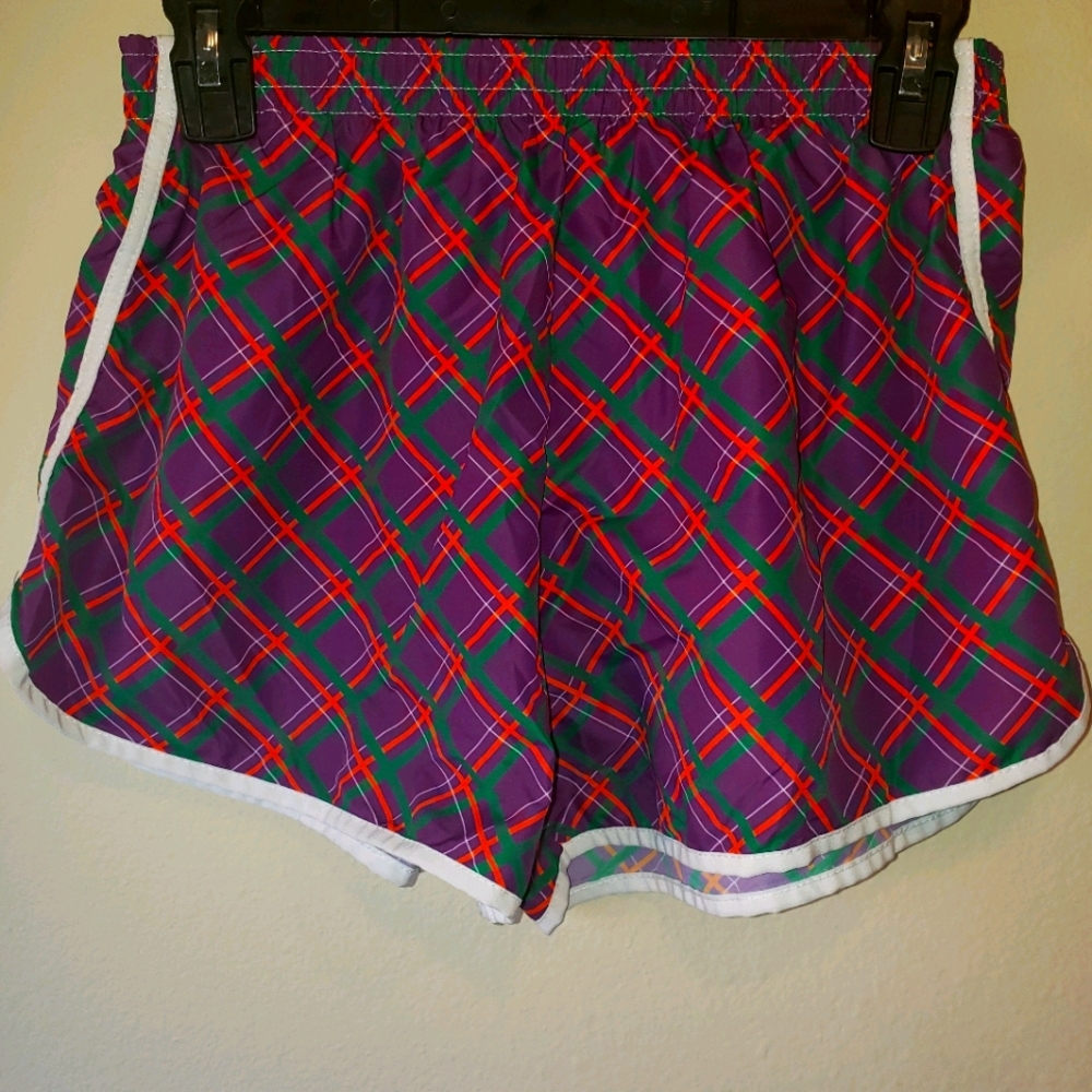 Purple, Green, Orange, White running shorts